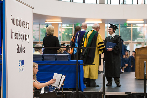 Elder Cornish and President Eyring congratulate graduates. Convocation for Foundations and Interdisciplinary Studies graduates. July 2017