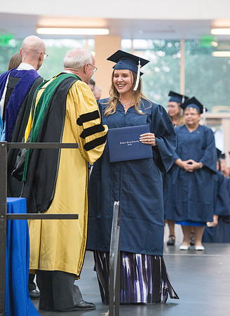 Elder Cornish and President Eyring congratulate graduates. Convocation for Foundations and Interdisciplinary Studies graduates. July 2017