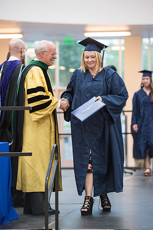 Elder Cornish and President Eyring congratulate graduates. Convocation for Foundations and Interdisciplinary Studies graduates. July 2017