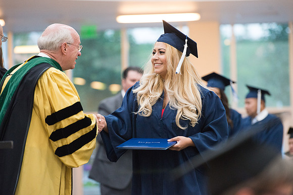 Elder Cornish and President Eyring congratulate graduates. Convocation for Foundations and Interdisciplinary Studies graduates. July 2017