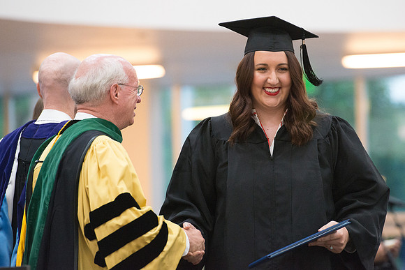Elder Cornish and President Eyring congratulate graduates. Convocation for Foundations and Interdisciplinary Studies graduates. July 2017