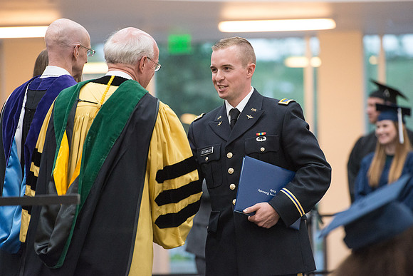 Elder Cornish and President Eyring congratulate graduates. Convocation for Foundations and Interdisciplinary Studies graduates. July 2017