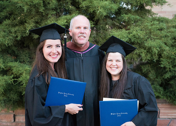 Graduates Ashley Kaelin and Emily Gottfredson with their professors