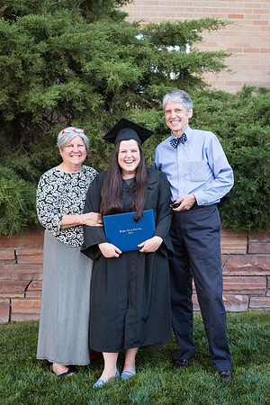 Graduate Ashley Kaelin with her parents