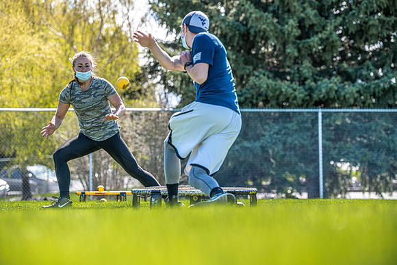 Spikeball tournament held on the upper playing fields, spring semester.