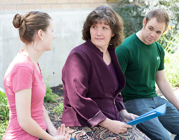Sister Brooke McKenna teaches students in a communication class.