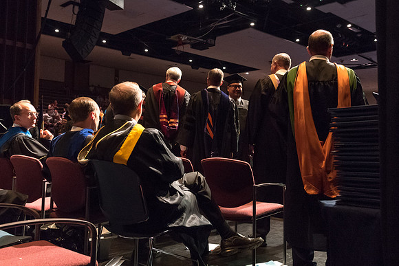 Business and Communications graduates recieve their diplomas at the Spring Convocation. 2017