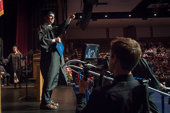 Business and Communications graduates recieve their diplomas at the Spring Convocation. 2017