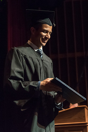 Business and Communications graduates recieve their diplomas at the Spring Convocation. 2017