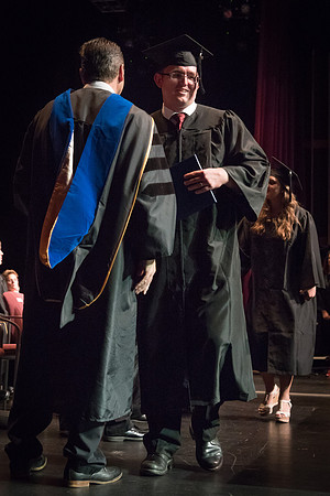 Business and Communications graduates recieve their diplomas at the Spring Convocation. 2017