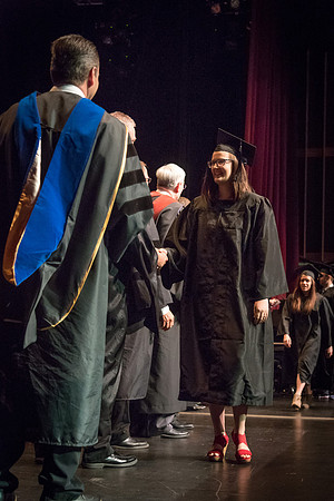 Business and Communications graduates recieve their diplomas at the Spring Convocation. 2017