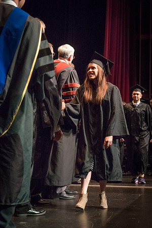 Business and Communications graduates recieve their diplomas at the Spring Convocation. 2017