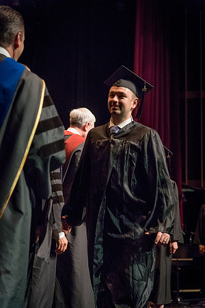 Business and Communications graduates recieve their diplomas at the Spring Convocation. 2017