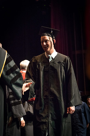 Business and Communications graduates recieve their diplomas at the Spring Convocation. 2017