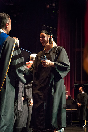 Business and Communications graduates recieve their diplomas at the Spring Convocation. 2017