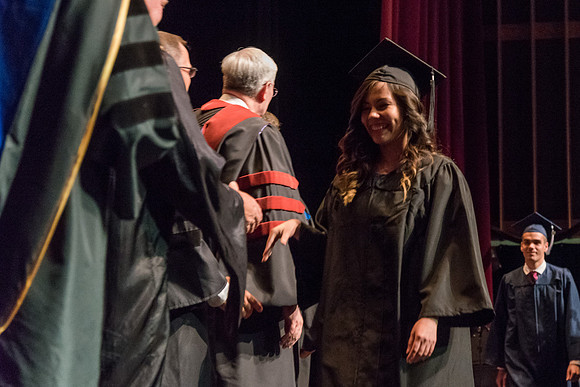 Business and Communications graduates recieve their diplomas at the Spring Convocation. 2017