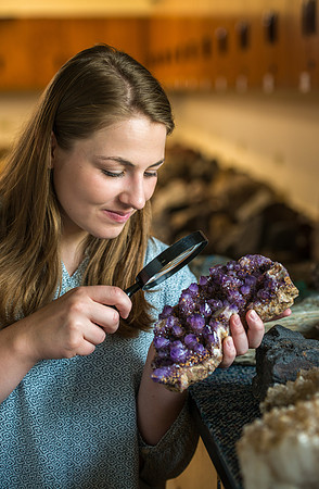 Alise Gardner studying rocks in the Geology Lab for the Ready Campaign.