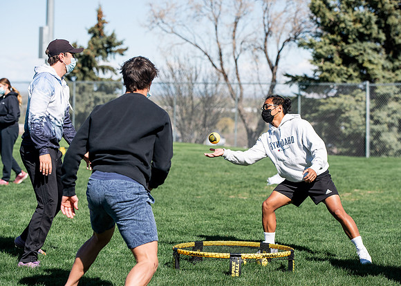 Student teams compete in BYUI's spikeball tournament held in the upper fields.
