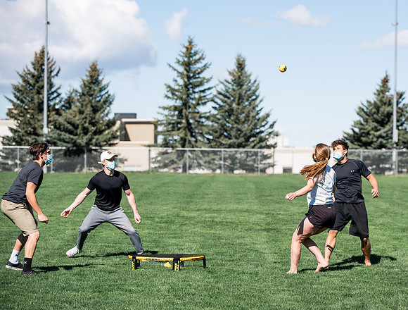 Student teams compete in BYUI's spikeball tournament held in the upper fields.