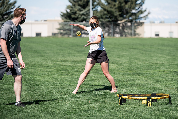 Student teams compete in BYUI's spikeball tournament held in the upper fields.