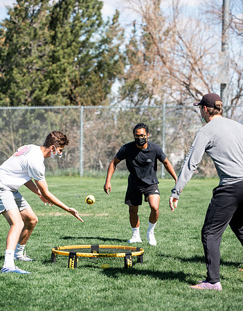 Student teams compete in BYUI's spikeball tournament held in the upper fields.