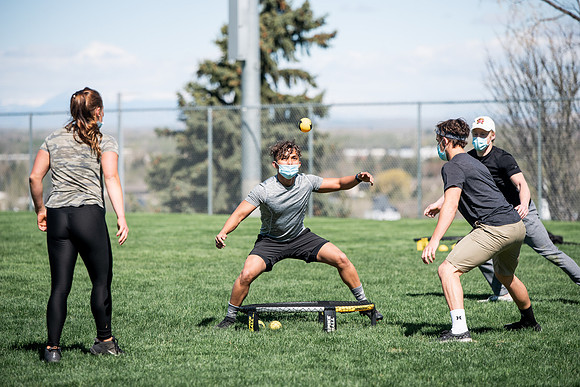 Student teams compete in BYUI's spikeball tournament held in the upper fields.