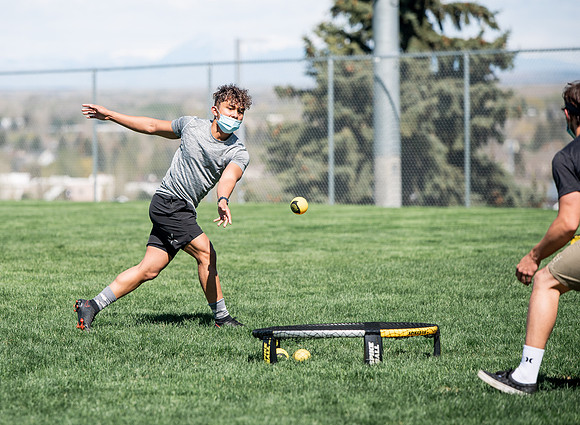 Student teams compete in BYUI's spikeball tournament held in the upper fields.