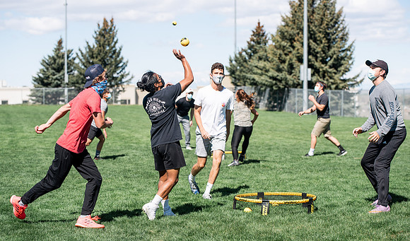 Student teams compete in BYUI's spikeball tournament held in the upper fields.
