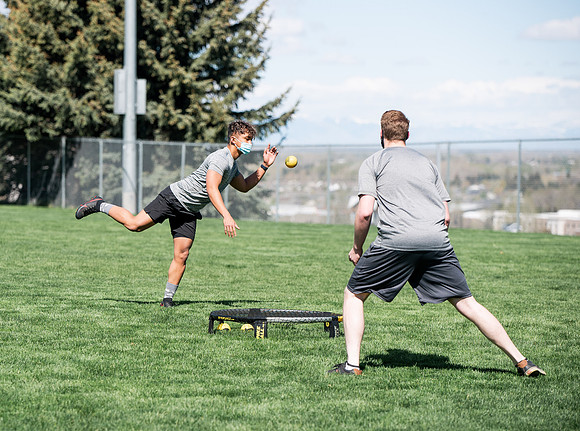 Student teams compete in BYUI's spikeball tournament held in the upper fields.