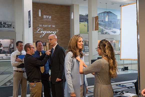 President and Sister Eyring are both fashioned with microphones in preparation for the video shoot in Legacy Hall. 2017