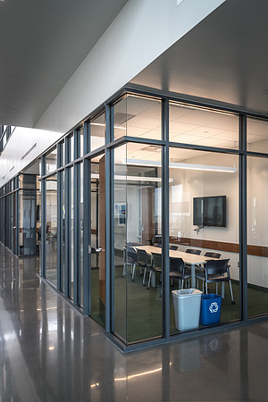 The STC has multiple study rooms with glass walls.