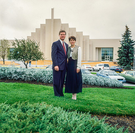 President and Sister Bednar pose in front of the Taylor Building.