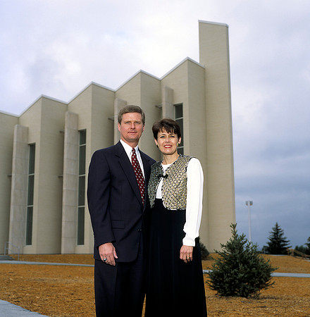 President David A. Bednar and his wife Susan in front of the newly completed John Taylor Building.