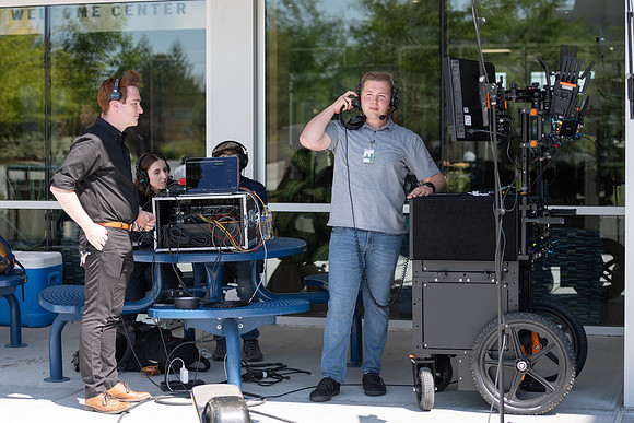 Admissions hosts a game show in the Taylor Quad. Video team behind the scenes.