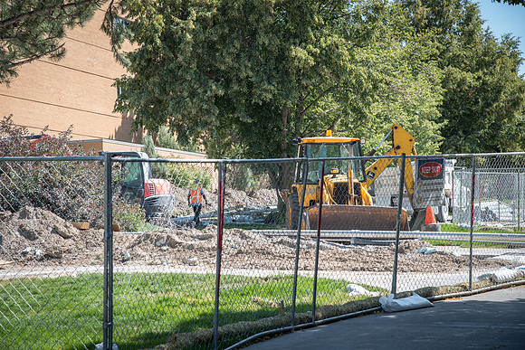 Construction happens on the sidewalk that passes by the Library. 2017