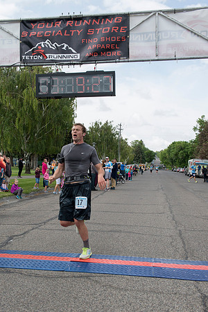 Teton Dam Marathon participants run towards the finish line at Smith Park in Rexburg, Idaho.