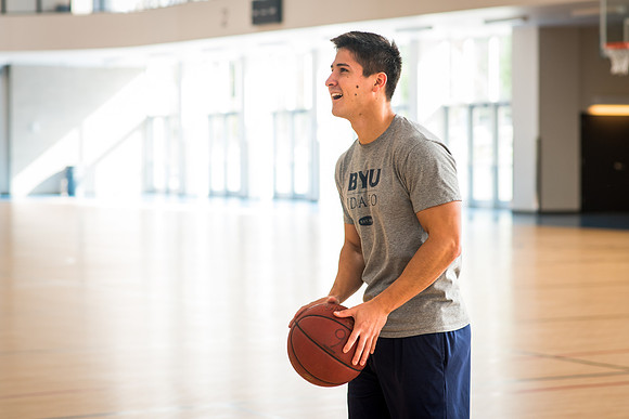Nick Zarate plays basketball in the I-Center courts. 2017