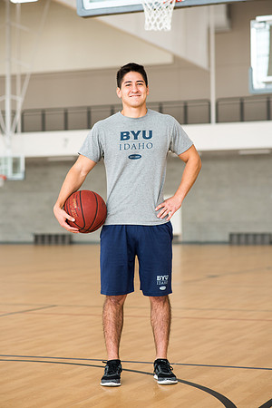 Nick Zarate plays basketball in the I-Center courts. 2017