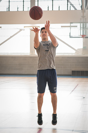 Nick Zarate plays basketball in the I-Center courts. 2017