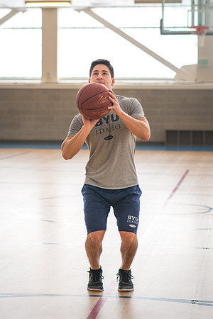 Nick Zarate plays basketball in the I-Center courts. 2017