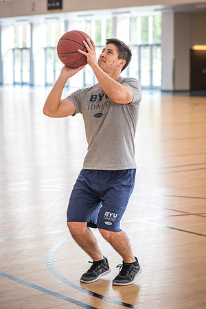 Nick Zarate plays basketball in the I-Center courts. 2017