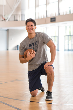 Nick Zarate plays football in the I-Center courts. 2017
