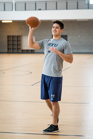 Nick Zarate plays football in the I-Center courts. 2017