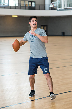 Nick Zarate plays football in the I-Center courts. 2017