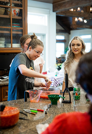 The Rexburg YSA 29th Ward in the Rexburg YSA 1st Stake makes jam for a Relief Society activity.