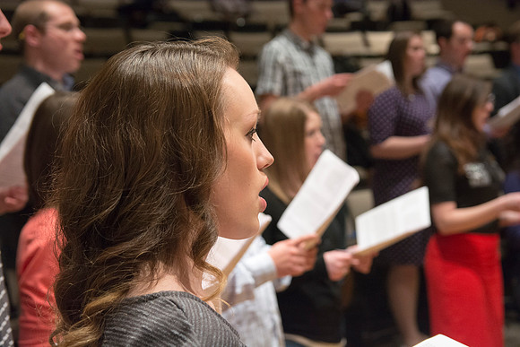 Randall Kempton instructs the talented students who make up the Collegiate Singers at BYU-Idaho.