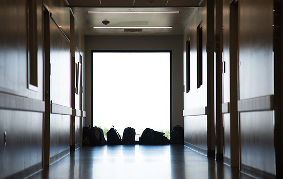 Students in the Food Processing Lab leave their backpacks out of the lab.