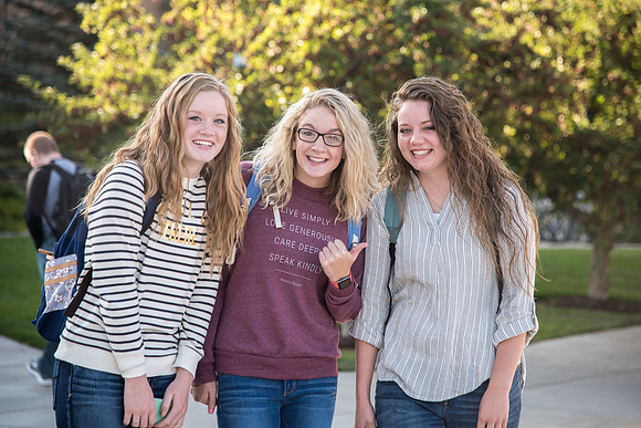Three young ladies back to school.