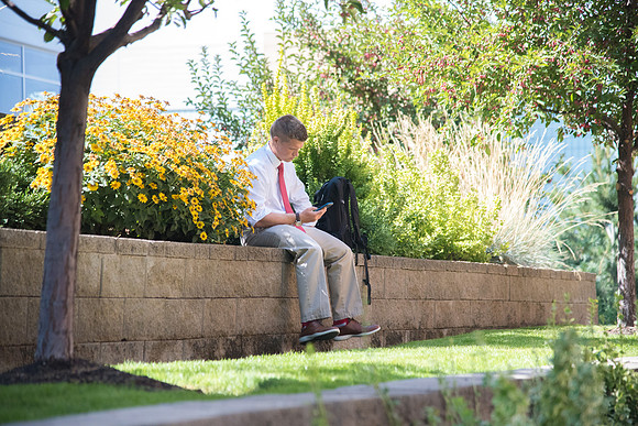 Students enjoy breaks from class outdoors while the weather is still warm.