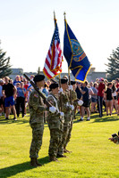 Students gather at the upper field for various 4th of July activities.